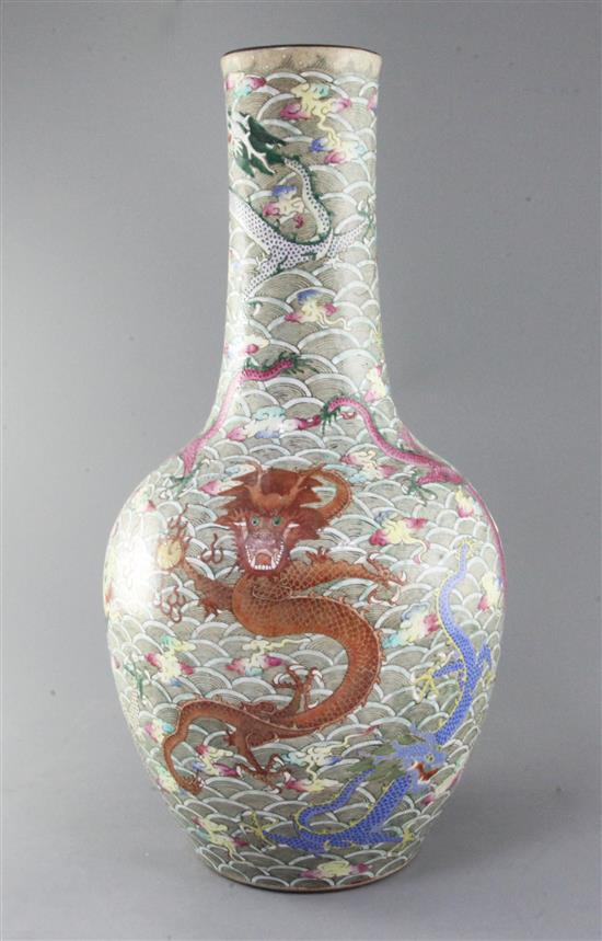A large Chinese famille rose enamelled dragon bottle vase, late 19th century, height 54.5cm